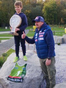 Adam Małysz z młodym sportowcem